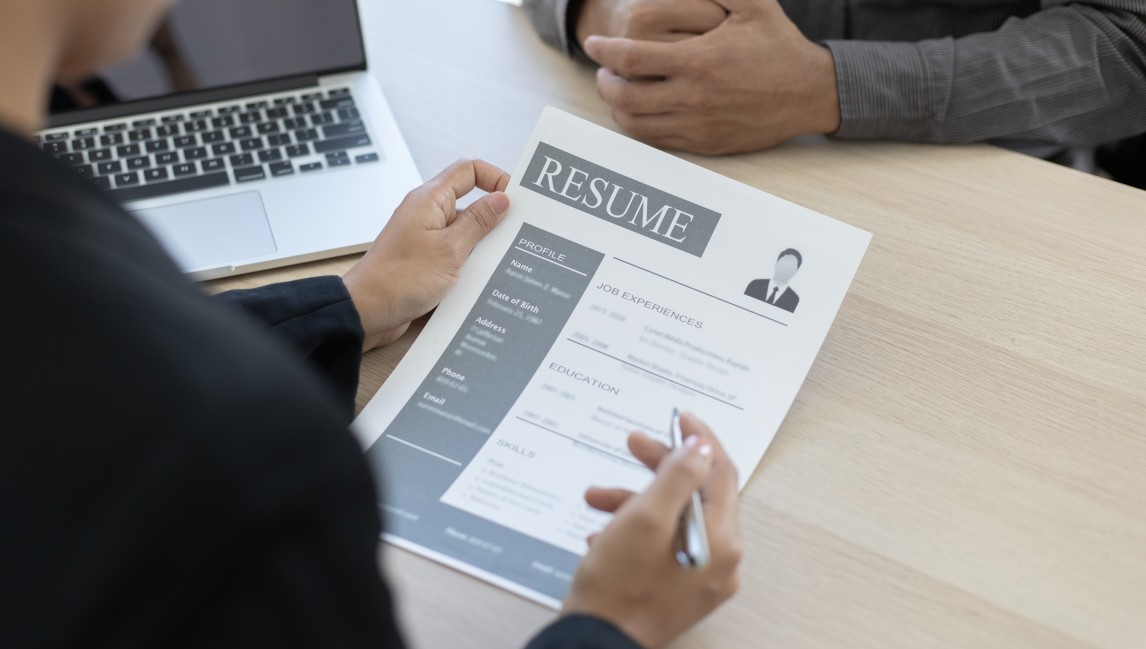 a hiring manager reading a great resume