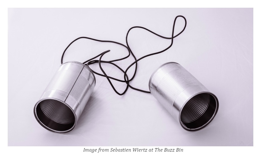 two telephone cans with long strings connected to each other - how to deal with your new boss
