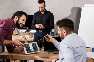 a group of professionals discussing the best linkedin headlines